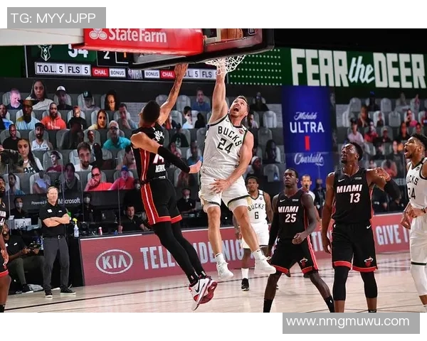 热火与雄鹿常规赛对决激战正酣球迷期待精彩瞬间与战术较量 热火与雄鹿常规赛对决激战正酣球迷期待精彩瞬间与战术较量